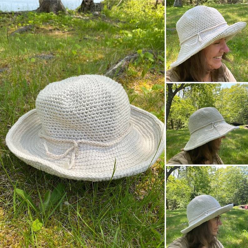 A white crocheted sun hat with a wide brim and a tied bow on the front.