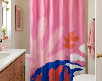 May include: A shower curtain featuring a vibrant abstract pattern with large organic shapes in shades of pink, orange, blue, and white. The design includes a solid pink background at the top, layered with fluid, rounded forms in contrasting colors.