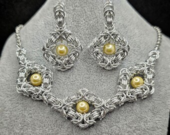 Elegant silver pearl necklace and earrings set