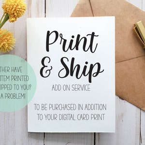 May include: White card with the words "Print & Ship" in black script. The card is an add-on service for digital card prints. A pen and envelope are in the background, along with yellow flowers.