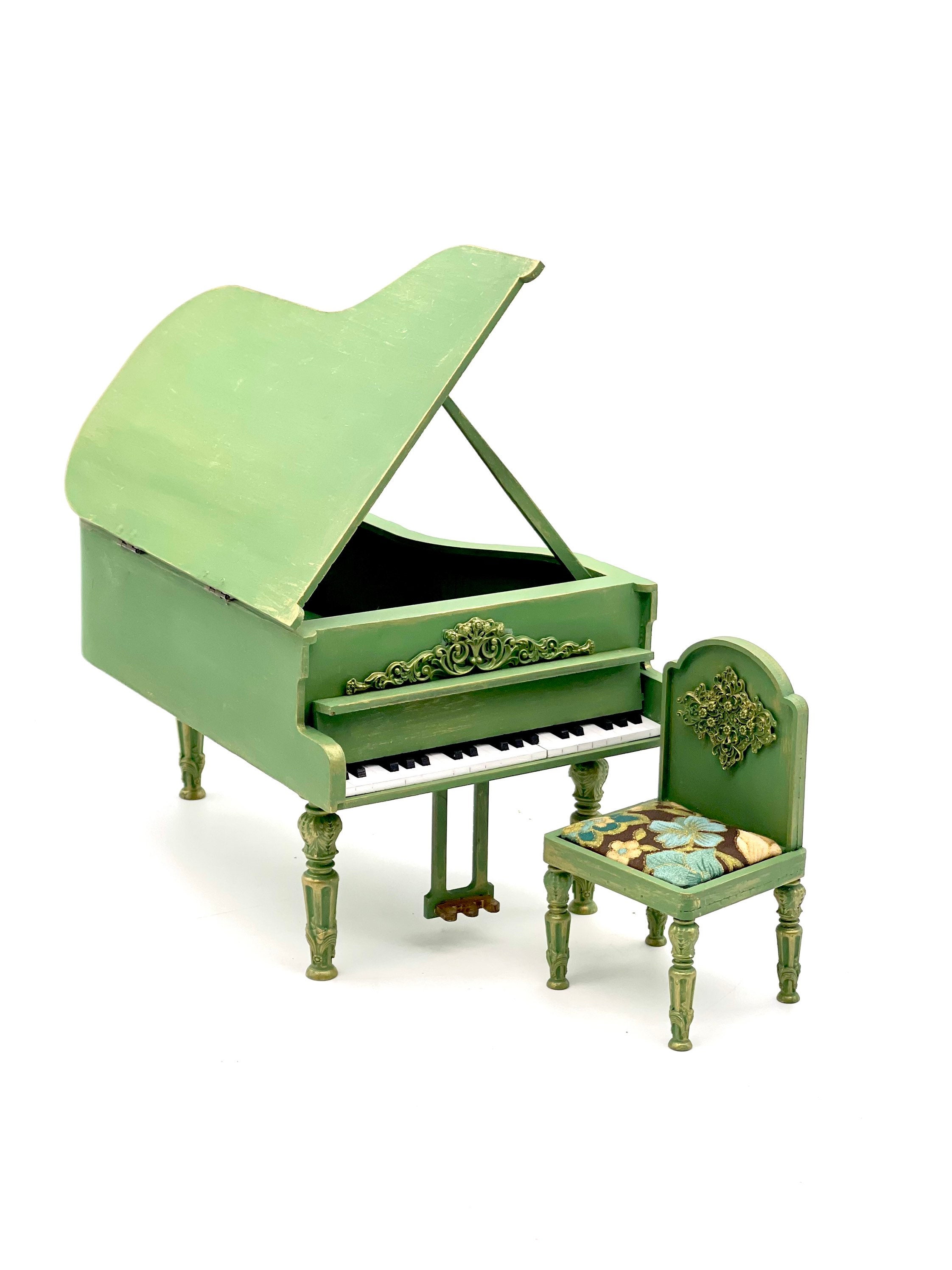 green grand piano