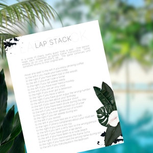 May include: A white card with black text and a black and green tropical leaf design. The text reads "Lap Stack" and includes a list of prompts for a party game.