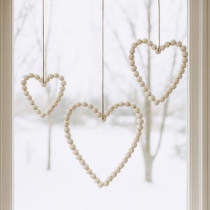 Close up of 3D printed bead heart with loop – printable no supports commercial license