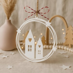 Minimalist 3D printable wreath STL file featuring two tall house silhouettes inside a circular frame Christmas or winter home decor