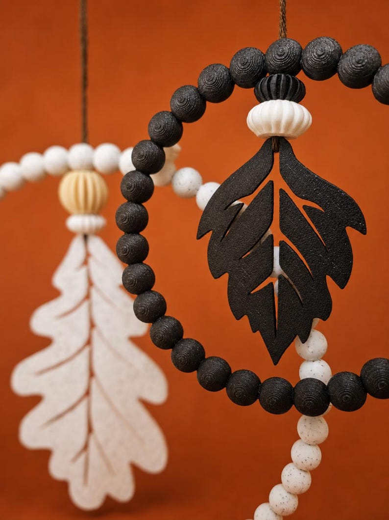 Detailed close-up of the smaller leaf wreath showing the printable bead ring, leaf insert and separate decorative bead components.