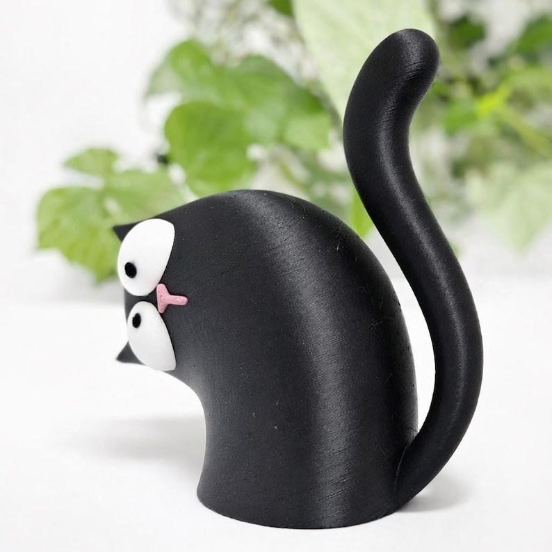 ide angled view of cute cat figurine 3D model with raised tail, 3D printable STL and 3MF file