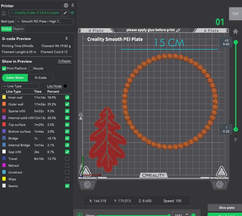 May include: A digital 3D printer software interface displaying a G-code preview on a Creality Smooth PEI Plate. The screen shows a circular orange object and a red leaf-shaped object with a 15 cm measurement indicator at the top of the build plate.