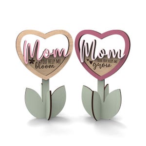 Mom flower stand SVG laser cut file with heart sign, layered lettering, and slot-together standing base for personalization