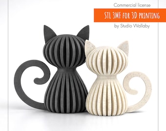 Puede incluir: Dos figuras estilizadas de gato, una negra y otra blanquecina, con un diseño acanalado. Los gatos tienen colas rizadas y orejas puntiagudas. El texto de la imagen dice "STL 3MF FOR 3D PRINTING" y "by Studio Wallaby."