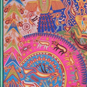 May include: A colorful, hand-painted artwork depicting a vibrant scene with a central circular motif. The artwork features a variety of figures, including animals, birds, and human-like figures, all rendered in a stylized, folk art style. The background is a mix of pink, blue, and green, with intricate patterns and details throughout.