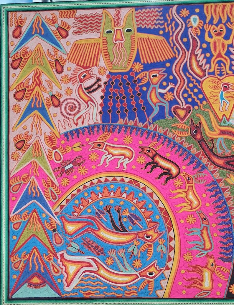 May include: A colorful, hand-painted artwork depicting a vibrant scene with a central circular motif. The artwork features a variety of figures, including animals, birds, and human-like figures, all rendered in a stylized, folk art style. The background is a mix of pink, blue, and green, with intricate patterns and details throughout.
