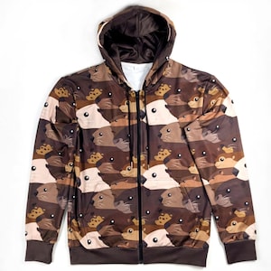 May include: A brown zippered hoodie with a full-color print of cartoon otters. The otters are in various shades of brown and white.
