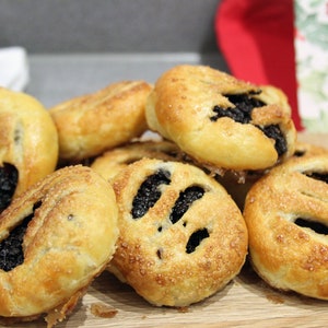 Eccles cakes with currant and glacé cherries