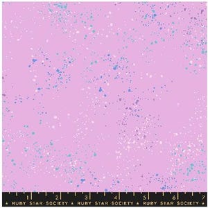 May include: A light purple fabric with a speckled pattern of blue, white, and purple dots. The bottom of the image has a ruler with the text "RUBY STAR SOCIETY".