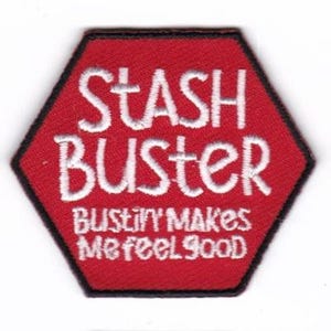 May include: Red hexagonal patch with white embroidered text that reads "Stash Buster" and "Bustify Makes Me Feel Good".