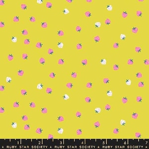 May include: A fabric with a bright yellow background, scattered with small pink and white strawberries. The strawberries have green stems. The text "RUBY STAR SOCIETY" is at the bottom.