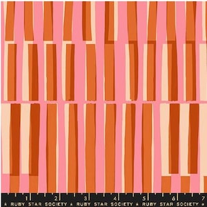 May include: A fabric with a repeating pattern of vertical rectangles in shades of orange and cream, set against a pink background. The bottom of the image features the text "RUBY STAR SOCIETY".