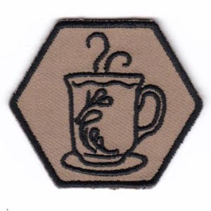May include: A brown hexagonal patch with a black outline features a stylized image of a steaming cup of coffee with a floral design.