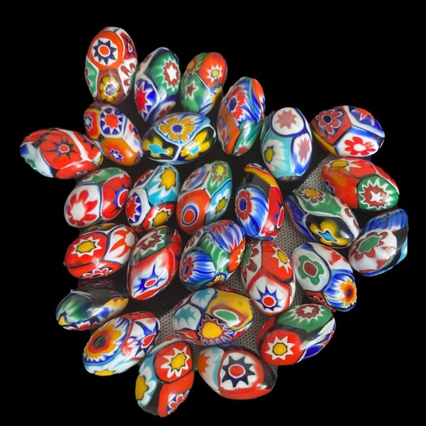 Vintage 16x9mm Italian Venetian Murano Ercole Moretti oval Millefiori glass bead. 1950’s. Measurements vary by 1mm