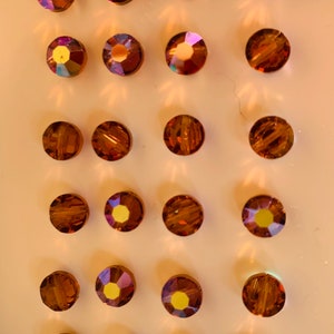 24pc Swarovski Crystal Colorodo Topaz AB  6mm Faceted Lentil 5100 Beads; or 360pc Swarovski Factory Pack; Aka Aspirin or tablet bead