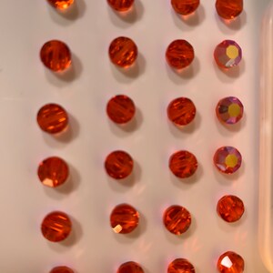 24pc Swarovski Crystal Hyacinth AB 6mm Faceted Lentil 5100 Beads; or 360pc Swarovski Factory Pack; Aka Aspirin or tablet bead