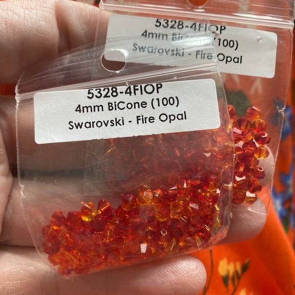 Q1, 36 pieces of 5 mm Swarovski fire opal Bicone Beads 5301