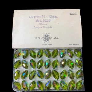 Factory pack Swarovski, 18x12mm Olivine AB Aurore Boreale oval beads  Q36