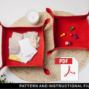 May include: Two red felt trays, one filled with playing cards and the other with game pieces, on a woven mat. A PDF file with the text "PDF" and an Adobe Acrobat logo is in the foreground.  PATTERN AND INSTRUCTIONAL FILE is written below the PDF file.