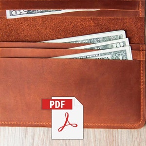 May include: A brown leather wallet with several pockets, filled with US dollar bills. The wallet is open, revealing the interior and the money. The PDF icon is in the lower right corner.