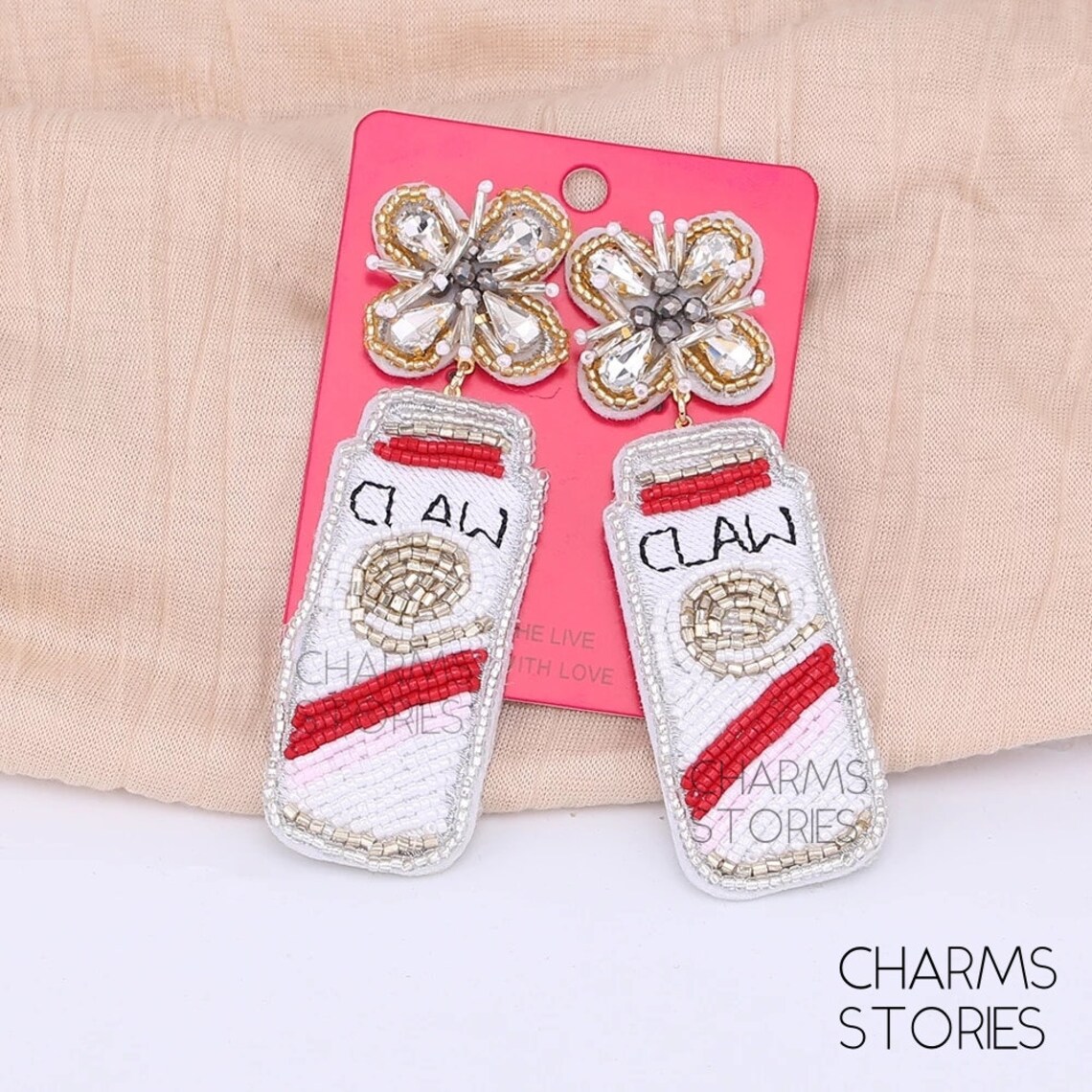 white claw beaded earrings