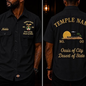 May include: A black short-sleeved button-down shirt with gold embroidery. The front displays "Noble" and "Temple Name No. 00 Oasis of City Desert of State". The back features a desert scene with a sun, camels, and "Temple Name No. 00 Oasis of City Desert of State".