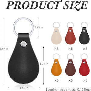 Può includere: Un portachiavi a goccia in pelle nera con anello argentato, lungo 9,3 cm e largo 4,1 cm. L'immagine mostra anche portachiavi beige, rossi e neri, ciascuno lungo 4,4 cm. Lo spessore della pelle è di 0,3 cm.