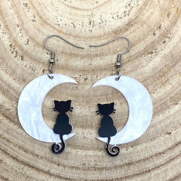 Pair of black cats sitting on a shimmering crescent moon earrings goth Wiccan new age fashion trendy novelty celestial