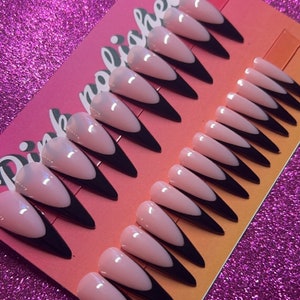 long black French tip Stiletto nails