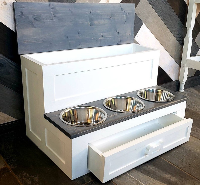 Free shipping!! Customizable 3- 64oz bowls dog feeder with back food storage and drawer for toys and treats. 50lbs food storage. 18x18x30
