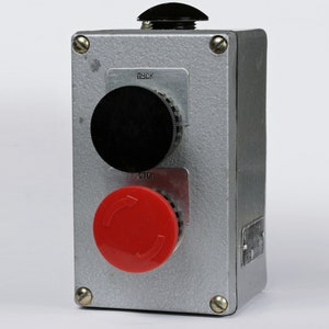 May include: A silver metal control box with two buttons. The top button is black and labeled "пуск" in Cyrillic. The bottom button is red and labeled "стоп" in Cyrillic.