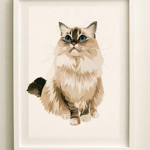 May include: A framed wall art print featuring a digital illustration of a long-haired cat with cream and brown fur, striking blue eyes, and a dark brown mask on its face. The artwork is displayed in a simple white rectangular frame.
