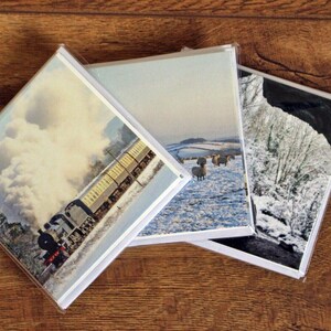 Pack of 15 Christmas Cards, notelets 10cm squared. England Snow Scenes, Trains