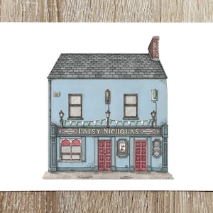 May include: A hand-drawn illustration of a blue building with a red door and a sign that reads "Patsy Nicholas". The building has a grey roof and a brick chimney. There are green and white flags hanging above the door.