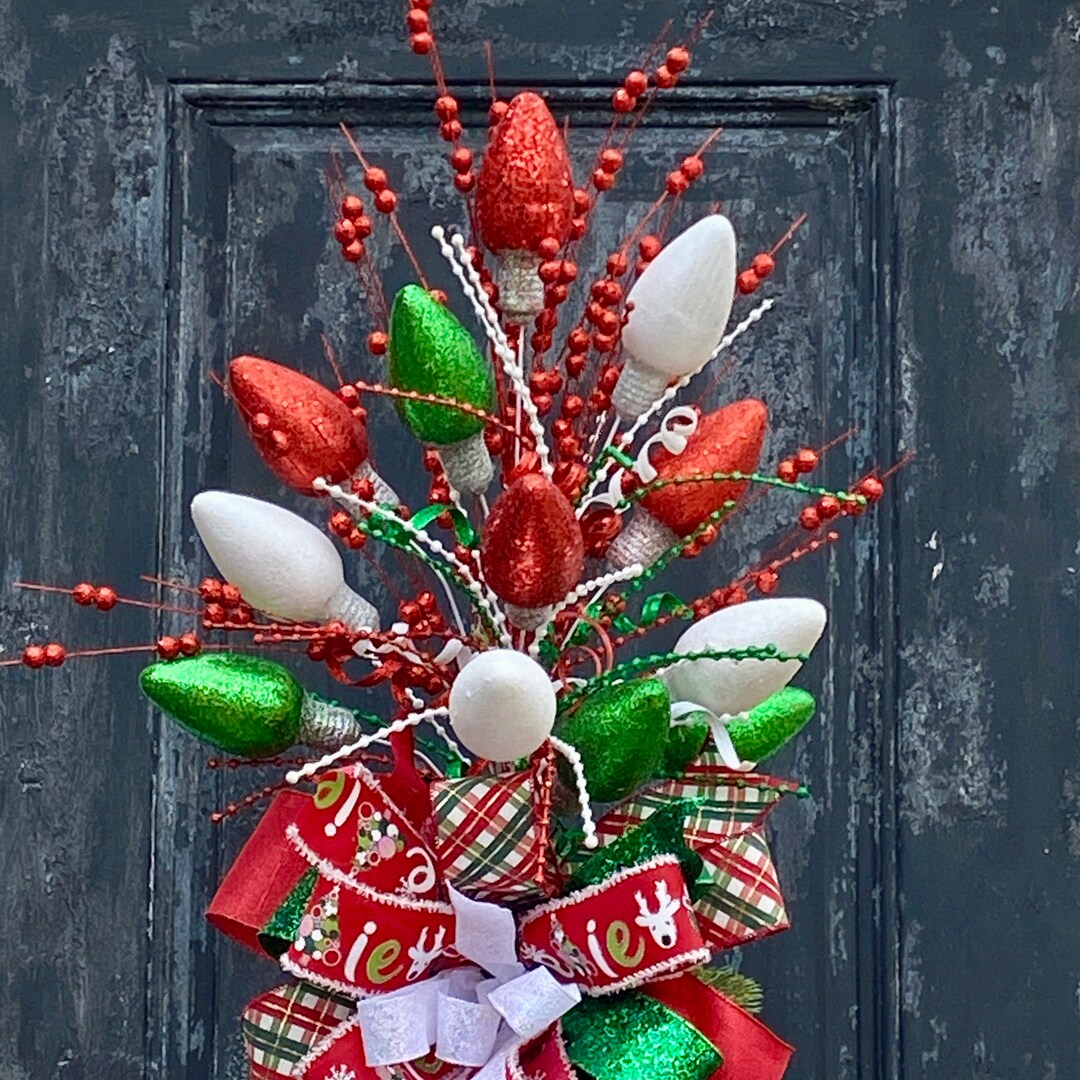 Red, White, and Green Christmas Light Themed Tree Topper With Bow