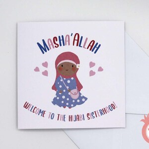 May include: A greeting card with a cartoon illustration of a girl wearing a pink hijab and a blue polka dot dress. The card says "Masha'Allah" and "Welcome to the Hijabi Sisterhood!"