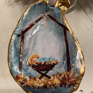 Baby Jesus in the Manger Christmas Ornaments