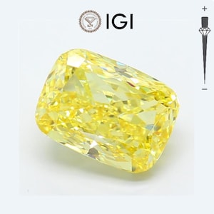 May include: A cushion-cut, fancy vivid yellow diamond. The gemstone is set against a white background. The IGI logo is visible in the upper left corner. The diamond's facets reflect light, creating a brilliant sparkle.