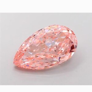 May include: A pear-shaped, faceted pink gemstone. The gem has a high degree of clarity and brilliance, with multiple facets reflecting light. The colour is a soft, delicate pink, and the overall shape is elongated and symmetrical.