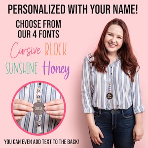 May include: A personalised wooden name tag with a beaded lanyard. The tag is oval shaped and has the name "CARLEY" engraved on it. The lanyard has colourful beads and a tassel. The image shows four font options: Cursive, Block, Sunshine, and Honey.