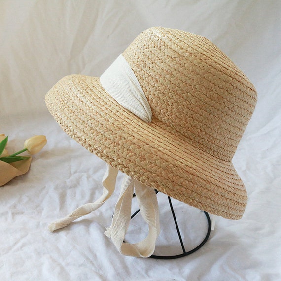 2021 New Straw Hat Female Mage's Retro Hepburn Style Long Belt Lafite Grass Seaside Holiday Shade Wide Brim Hat H202169