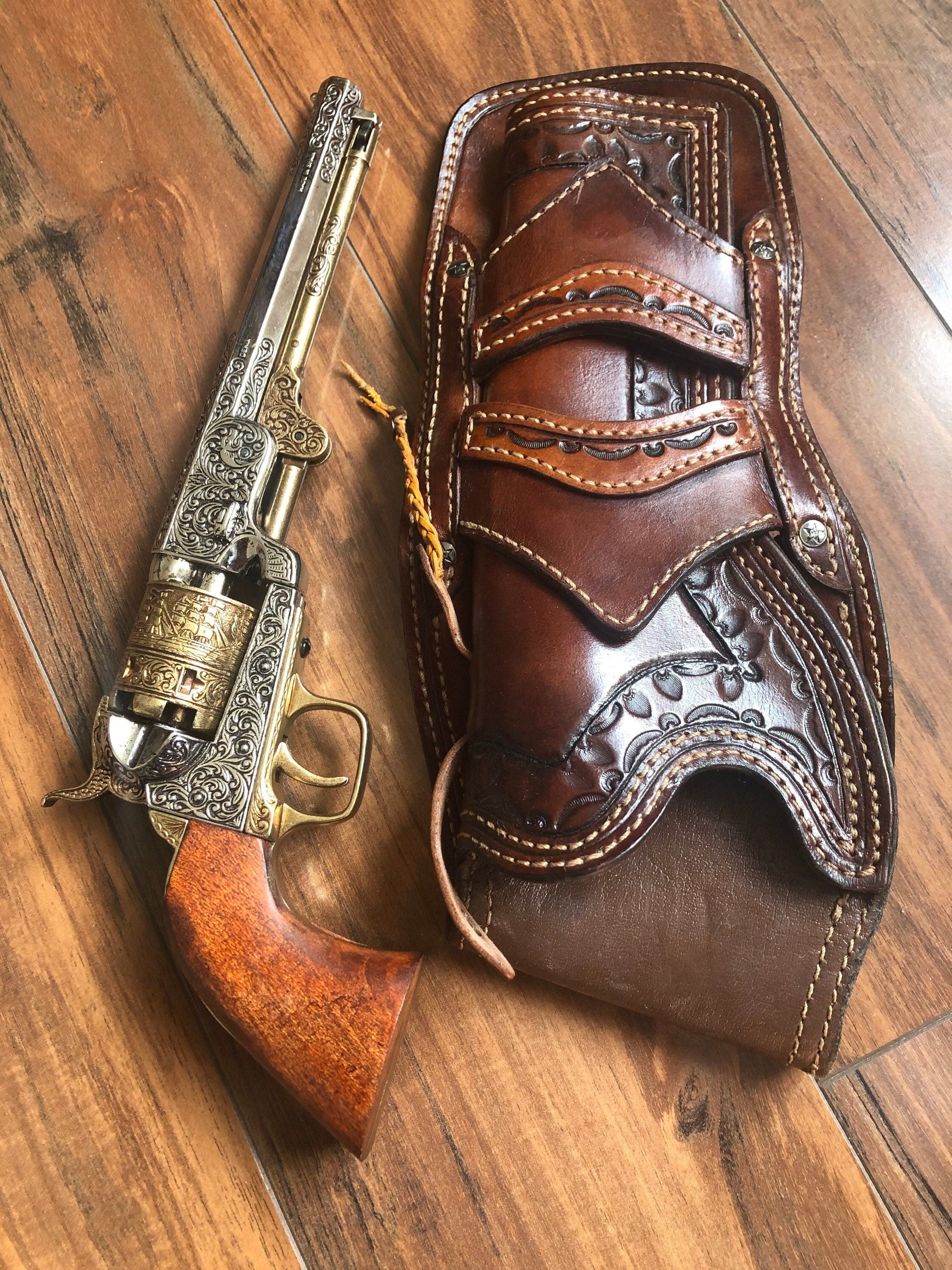 Cowboy pistol holsters top