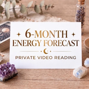 May include: A white rectangular card with gold text reading 6-MONTH ENERGY FORECAST PRIVATE VIDEO READING, accompanied by a deck of tarot cards, a purple amethyst cluster, three moonstone pieces, a lit beeswax candle, and dried lavender.
