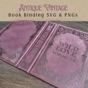 May include: Open book with a dusky pink cover and silver embossed detailing. The book is titled "Wild Love" by Elsie Silver. The text "Antique Vintage Book Binding SVG & PNGs" is at the top.