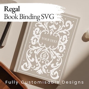 Pode incluir: Um livro bege com um design floral branco e o texto "YOUR TEXT" em uma moldura retangular. O livro é rotulado como "Regal Book Binding SVG" e "Fully Customisable Designs". A capa apresenta um padrão ornamental e simétrico.